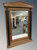 An empire style pine mirror, 87 cm x 61 cm.