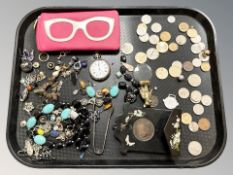 A group of costume jewellery, coins, silver pocket watch, pair of silver sugar tongs,