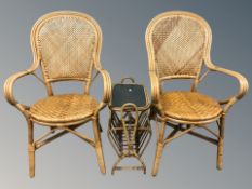 A pair of bentwood and wicker armchairs and similar magazine table