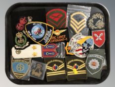 A group of reproduction military insignia.