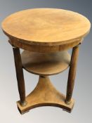 A Continental walnut circular occasional table,