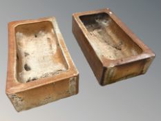 A pair of Walker of Corbridge stone ware planters,