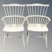A pair of painted spindle backed chairs,