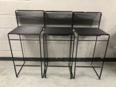 Three wire metal bar stools, height 102 cm.