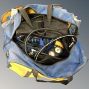 A hold-all containing scuba diving equipment.