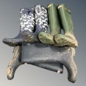 Two pairs of Hunter wellington boots and a further pair of Radley boots, size 5.