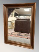 A continental stained beech framed mirror, 63 cm x 84 cm.
