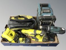A Makita drill, radio pack, Ryobi saw, charger and bag.