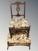 A late Victorian mahogany occasional chair and an Ercol stool.