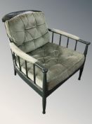 A painted framed Scandinavian armchair.