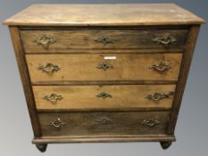 A 19th century oak four drawer chest, 97 cm x 48 cm x 94 cm.