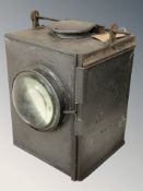 An LMS railway/signalling lamp, height 37 cm including handle,