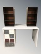 A painted table fitted drawers and shelf beneath,