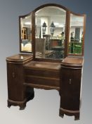 An early 20th century continental mahogany dressing table, 127 cm x 52 cm x 184 cm.