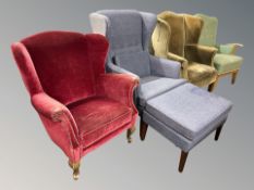 Three 20th century wingback armchairs, one with matching footstool,