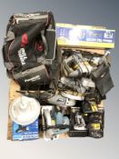 A group of power tools including Titan, tool bag, tile cutter, enameled light shade.