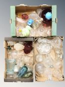 A large quantity of 20th century glass ware including light shades, decanters, coloured glass items,