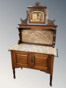 A late Victorian walnut and marble wash stand, 100 cm W x 47 cm D x 166 cm H.