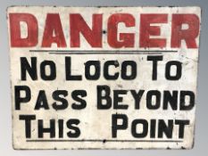 A 20th century enameled metal sign 'Danger, no loco to pass beyond this point', 72 cm x 56 cm.