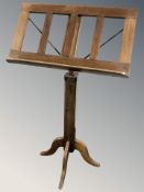 An early 20th century music stand, height 106 cm.