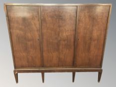 A Scandinavian triple door sideboard,