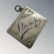 A silver enamel stamp case