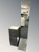 A modern mirrored cheval mirror, height 175 cm, and similar chest.