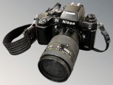 A Nikon F4 35mm film camera with AF Nikkor 35-70mm 1:2.8 D lens.