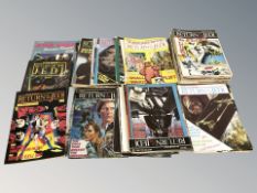 A quantity of Star Wars comics.