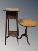 A pine plant stand and an oak tripod table.