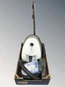 A Nilfisk vacuum cleaner and accessories.