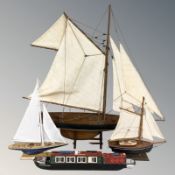 Three model yachts, largest 87 cm, and a further model of a narrow boat.