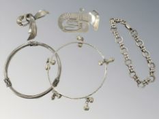 A group of silver jewellery, tuba brooch, bracelet etc CONDITION REPORT: 69.