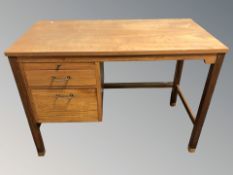 A 20th century Danish teak single pedestal desk,