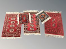 Five various Bokhara rugs/mats,