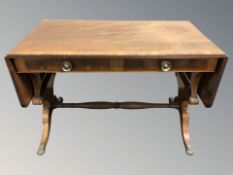 A continental inlaid mahogany drop leaf sofa table,