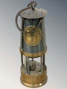 An Eccles Protector Type SL miner's safety lamp.