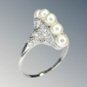 An Art Deco pearl and diamond crest ring,