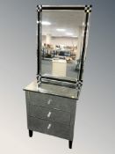 A modern mirrored three drawer chest, 70 cm x 46 cm x 84 cm, and similar mirror.