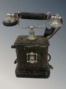 An early 20th century continental telephone, height 32 cm.