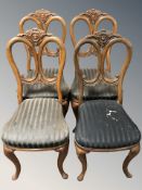 Four 19th century continental mahogany dining chairs