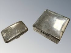 An antique silver cigarette case and a silver cigarette case with teak lining, width 8.
