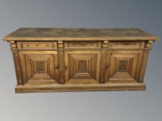 A Victorian panelled oak sideboard, 223 cm x 70 cm x 95 cm.