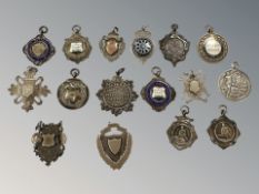 A group of silver fobs and medals, 152g gross.