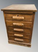 An early 20th century oak five drawer index chest,