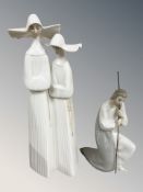 A Lladro figure of Joseph and a further figure of two nuns No. 4611.