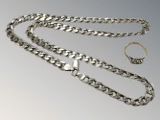 An 18ct gold and platinum three stone diamond ring, size O,