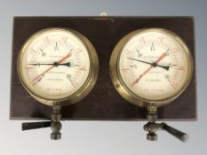 A pair of James Mercer (Preston) Limited brass cased altitude gauges, each mounted on wooden plaque,
