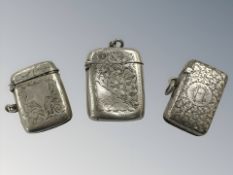 Three antique silver vesta cases, largest 5 cm long. CONDITION REPORT: 63.3g gross.