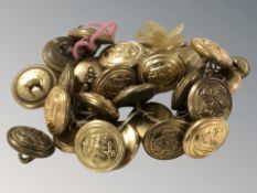 A small collection of naval buttons.